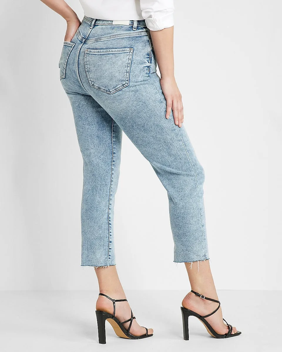 Conscious Edit Super High Waisted Raw Hem Mom Jeans in Medium Wash